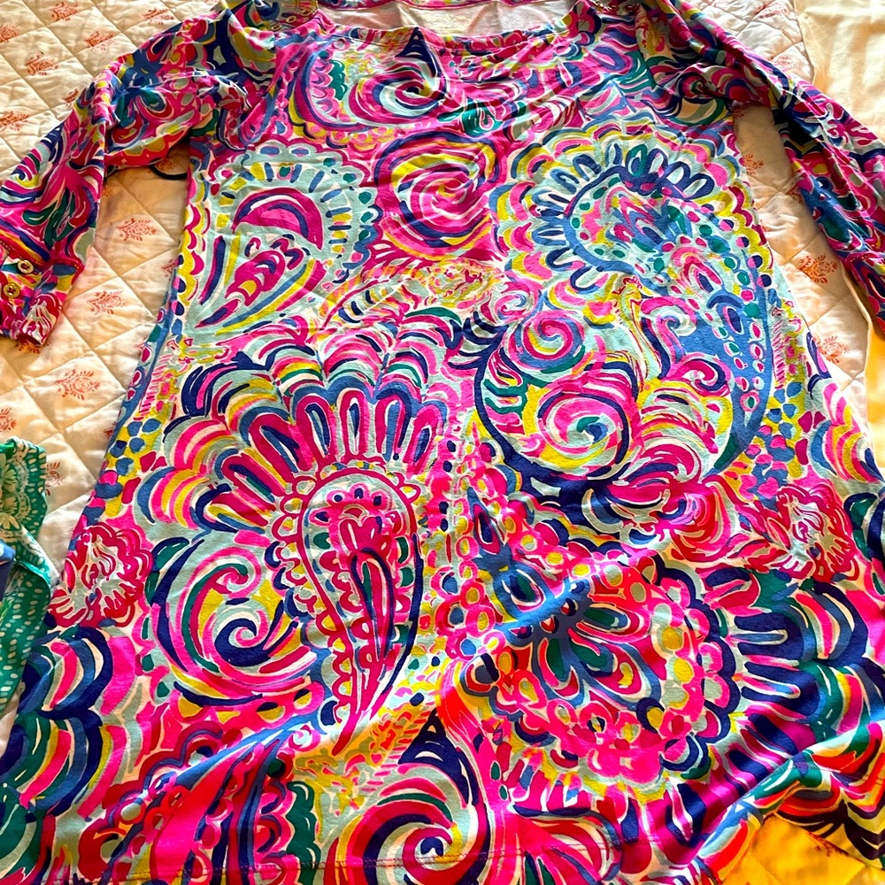 Good used condition. All buttons and colors are still nice. Washed & dried flat